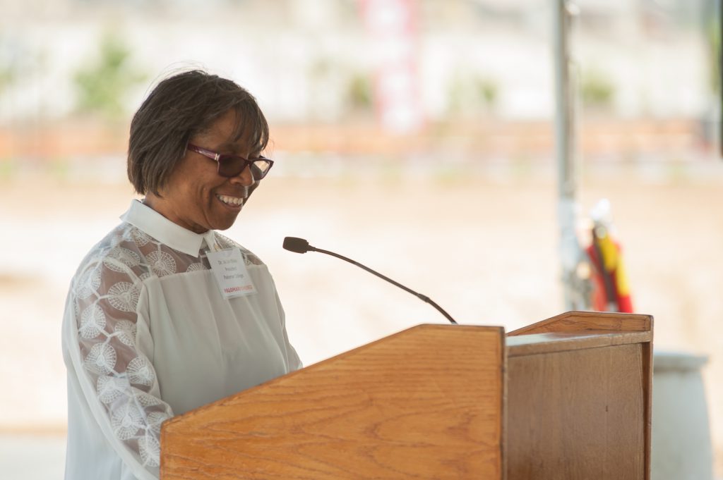 Dr. Blake standing at the podium