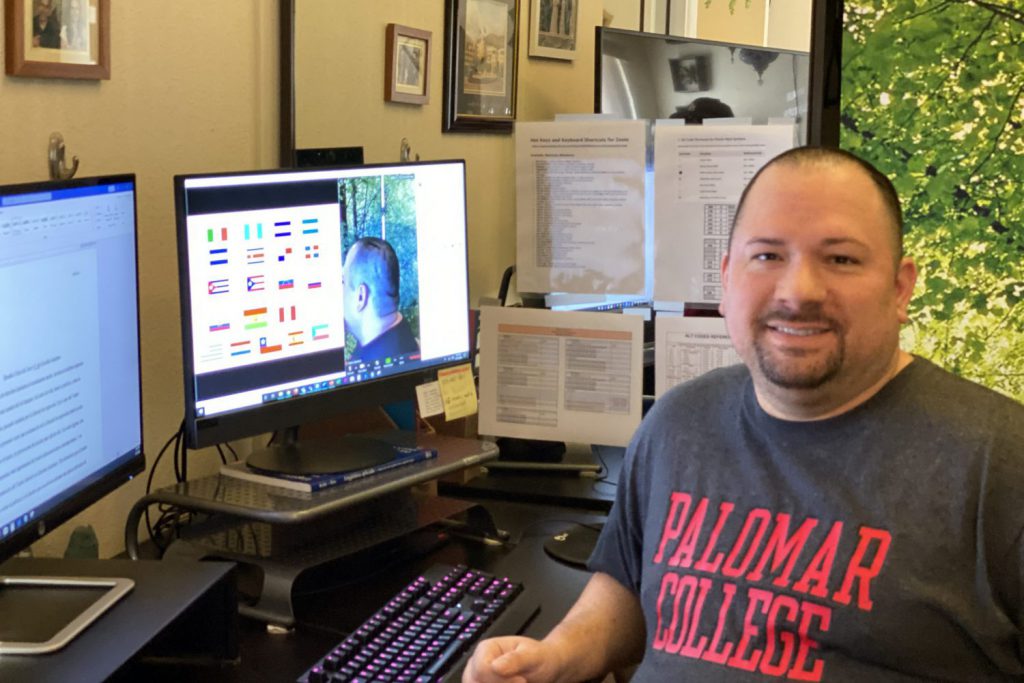 Palomar tutor in front of computer