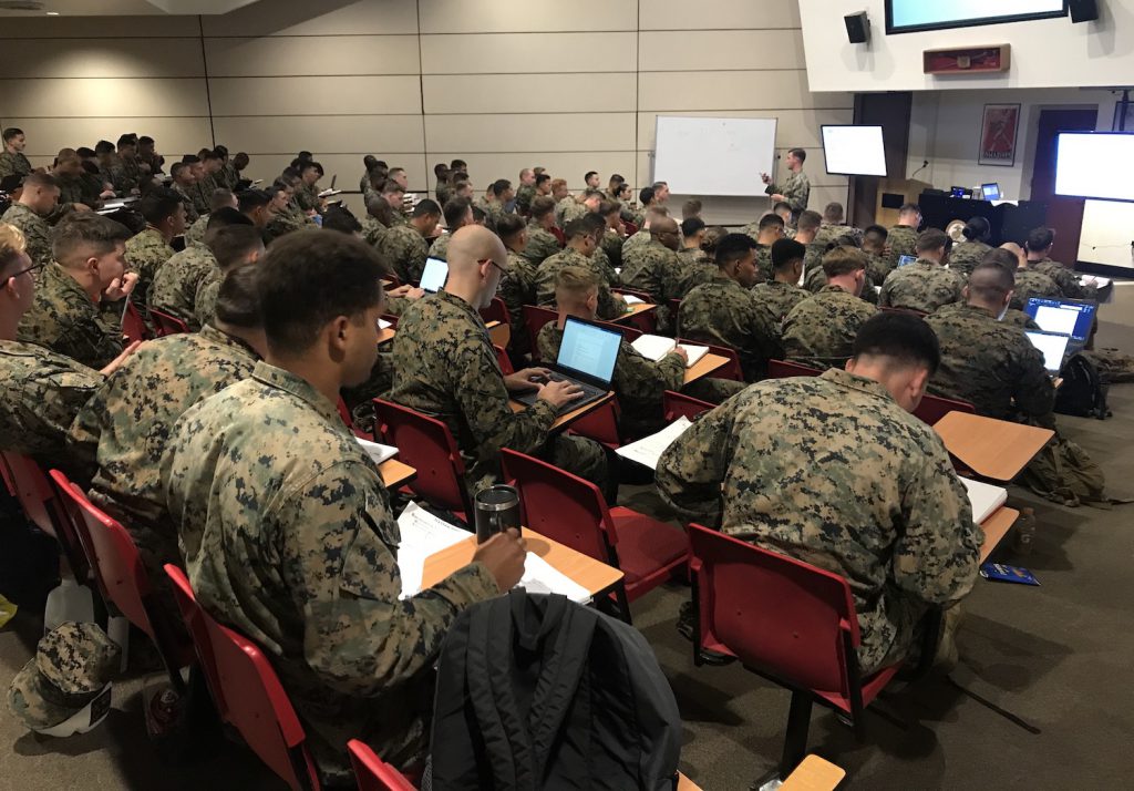 Classroom of marine students in uniform attending a lecture