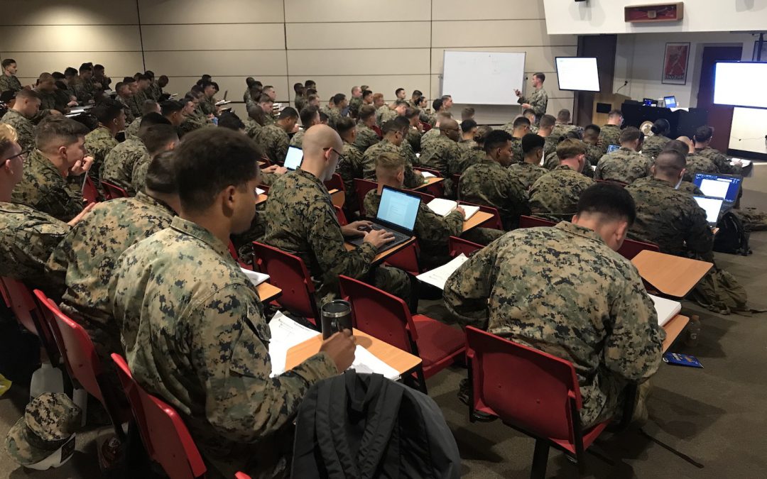 Classroom of marine students in uniform attending a lecture