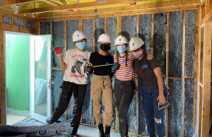 Palomar College architecture students wearing hard hats