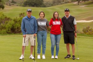 Golfers and supporters wearing Palomar shirts on the golf course