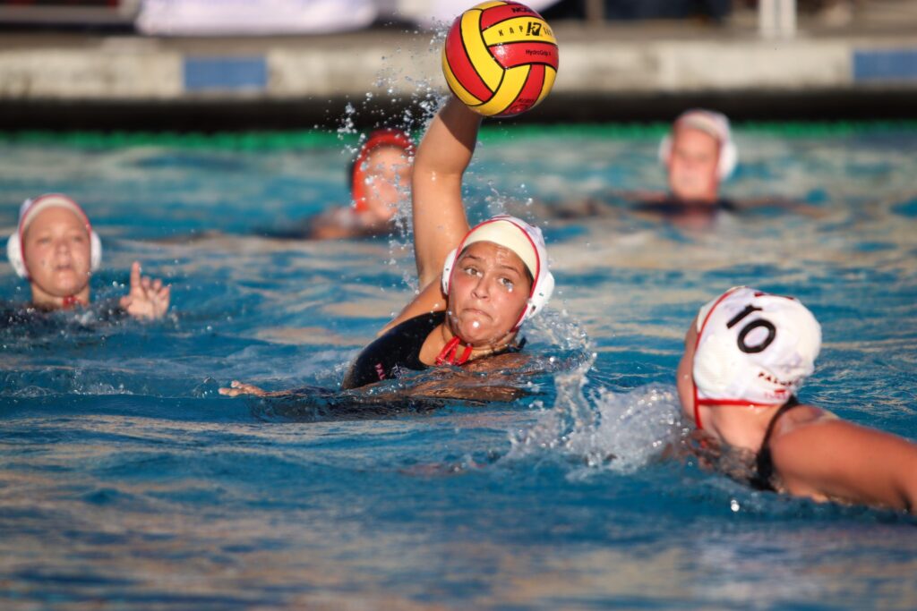 Palomar College women’s water polo team playing a game
