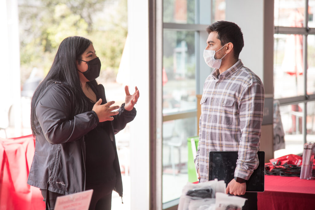 Palomar students engaged in discussion on campus