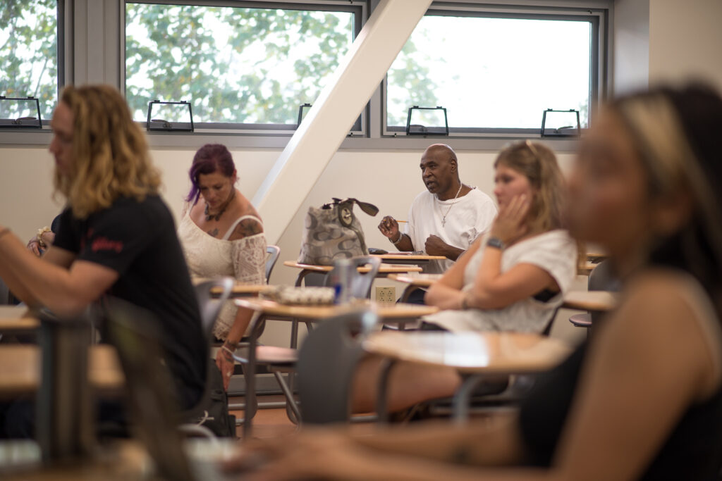 Palomar College students sitting at desks in a classroom