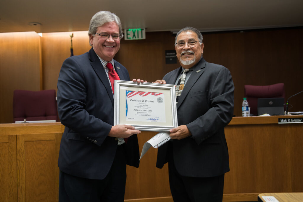 Trustee Mark Evilsizer receiving a Certificate of Election