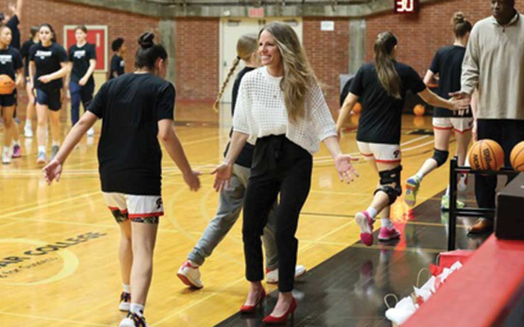 Coach Leigh Marshall on the basketball court