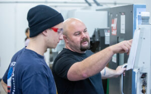 Student and Professor in the Industrial Machining Lab