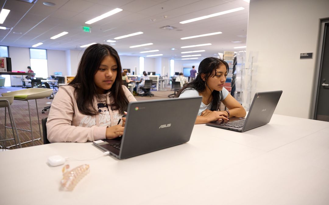 Two Palomar College students studying in the Library at the San Marcos campus