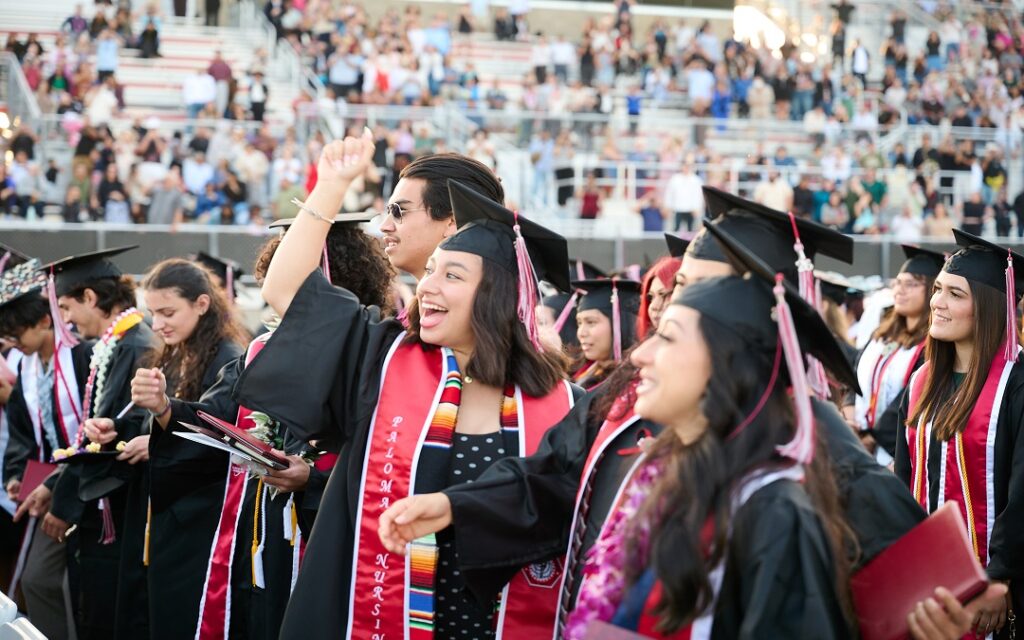 Palomar College graduates celebrating at the 2026 commencement