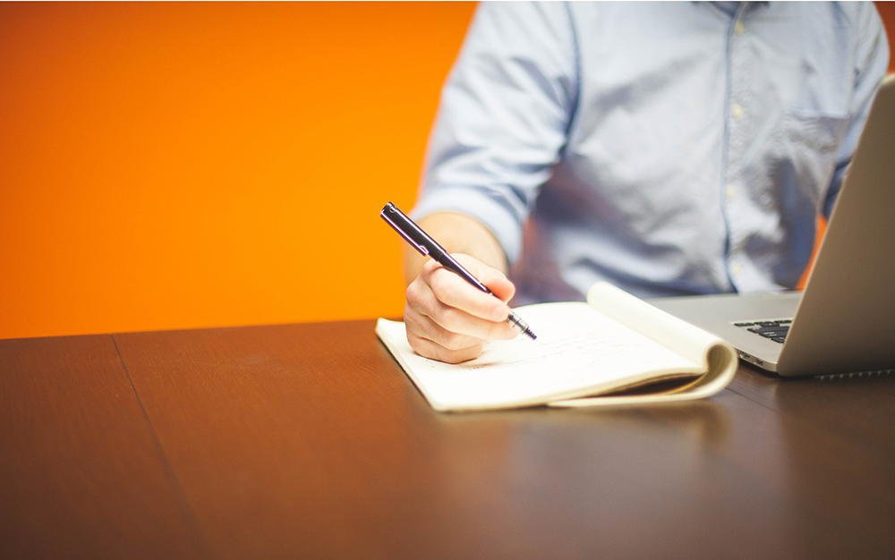 Businessman writing