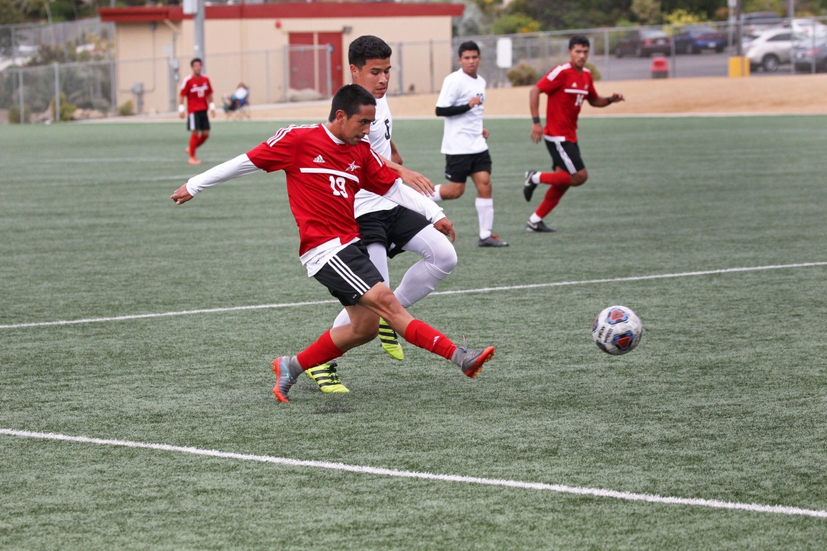 Palomar Soccer Player Kicking the Ball in a Game