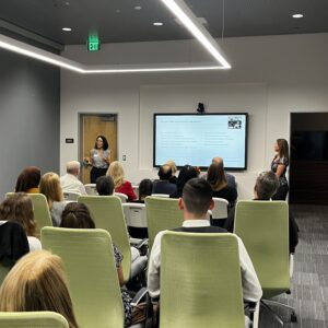 Photo of Service Learning Coordinators presenting the student awards