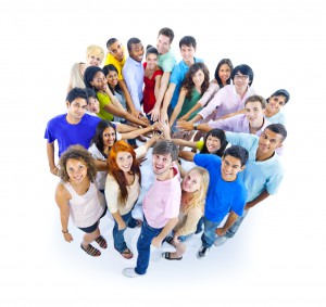 Photo of several dozen college students in a circle