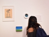 Art Student karleen Yuen looks at the collection by collecting artist Wendy Wilson-Gibson at the The Maker's Eye opening. Oct.5th, Boehm Gallery,Palomar College. Victoria Bradley/The Telescope