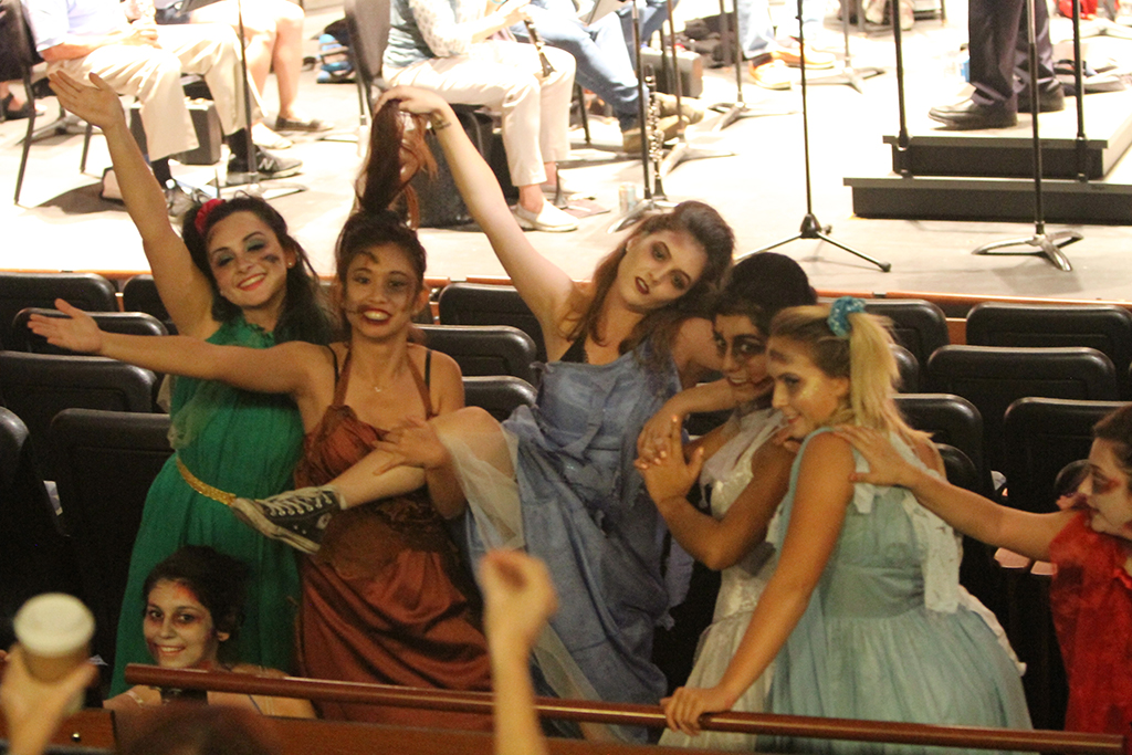 Zombie Prom Dancers strike a pose during dress rehearsal on Oct 5 in the Bruebeck Theatre. Music Danse Macabre by Saint Saens accompanied by the Palomar Pacific Coast Concert Band and Choreography by Molly Faulkner. Julie Lykins / The Telescope