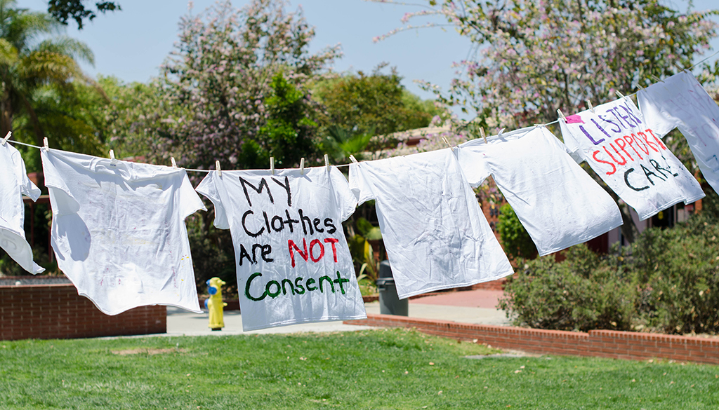 Shirts painted by Palomar College students hang on a clothesline in support of the No More Campaign, a quest to increase national awareness of domestic violence and sexual assault as well as unite the efforts of both movements to end gender-based violence. This was just a part of Palomar College's Career Day held at the Student Union on April 27. Tracy Grassel/The Telescope