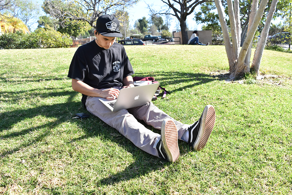 Palomar student Marshall Harmon studying on the lawn in front of the library Jan. 25. Youssef Soliman/The Telescope