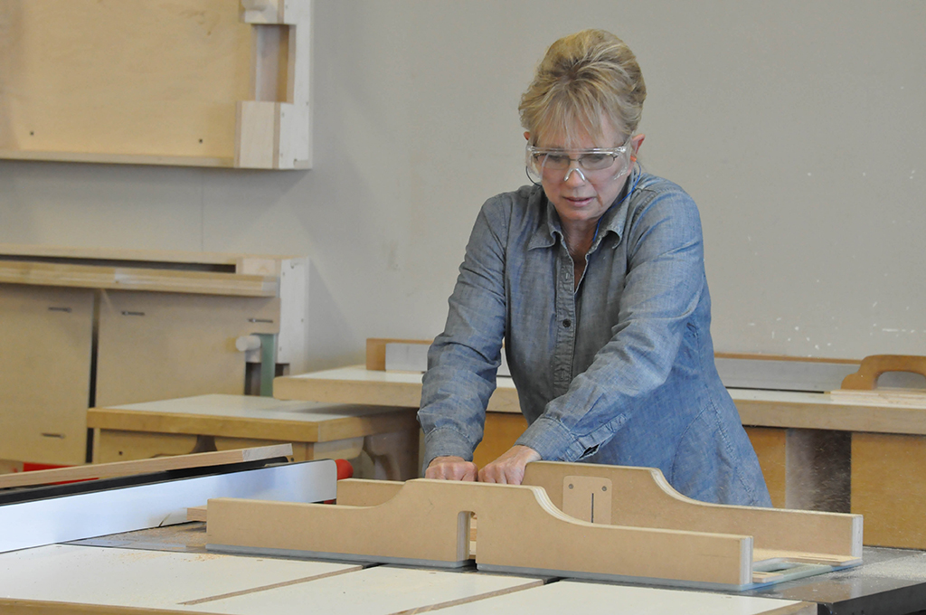 Palomar student Mary Morris attend her first year of basic where she has to measure cut and assemble an clock in Palomar ‘s woodshop shop classes. Johnny Jones / the telescope.