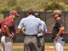 Palomar head coach Buck Taylor (r) and Southwestern College head coach Jay Martel (l) meet at home plate with umpires for the pre-game conference on April 21 at Palomar College Ballpark. The Comets won the game 12 - 7. Aaron Fortin/The Telescope