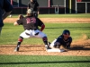 Orange Coast player is out at first base guarded by Palomar's Nick Juhl (22) on Feb. 9 at the Palomar College Ballpark. Olivia Meers/The Telescope