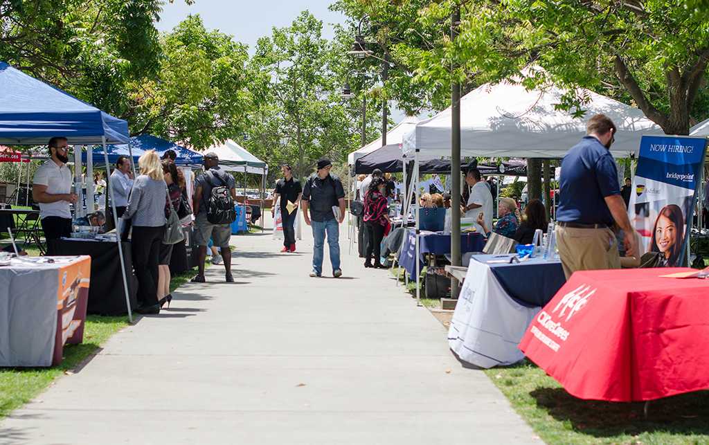 Palomar students participate in Career Day that took place on the grassy area of the Student Union on April 27. Employers such as BridgePoint, LegoLand, Chula Vista Police Department were only a few businesses that students could inquire information from. Tracy Grassel/The Telescope