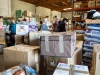 Hardworking Palomar ESL Students help package donations to Rockport, Texas at Crop Production Services in Fallbrook, California, Nov 3. Raffaele Reade/The Telescope