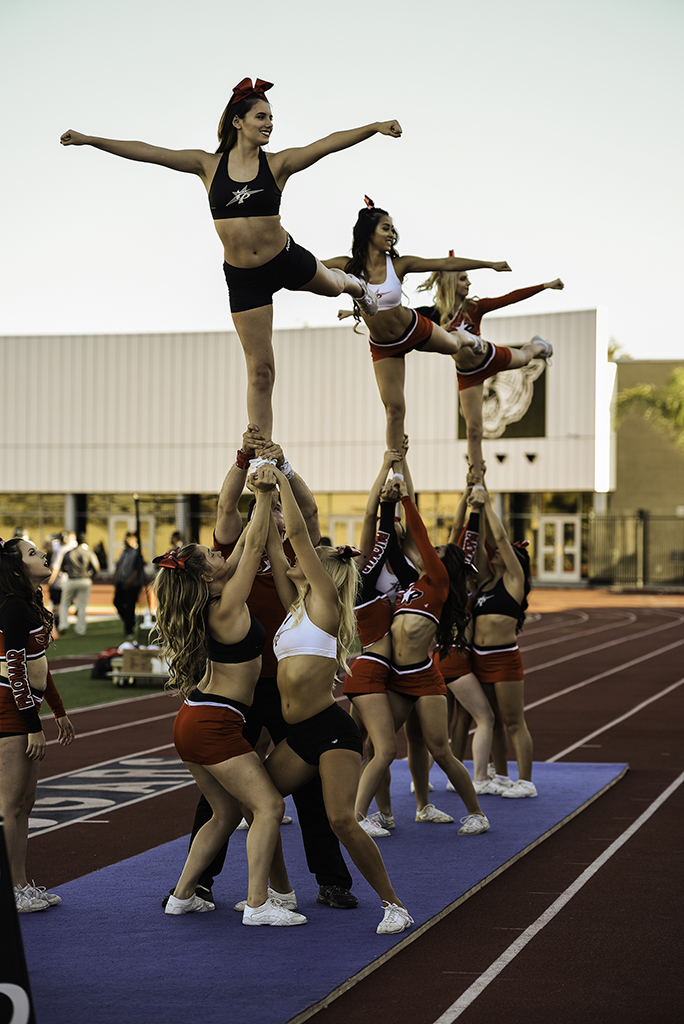 Palomar Comets cheerleaders perform at Saturday's football game between the Palomar Comets and the Moorpark Raiders. The Palomar Comets defended themselves well against the Raiders, but were defeated 31-26 at Wilson Stadium in Escondido on Sept. 24. Mitchell P. Hill/The Telescope