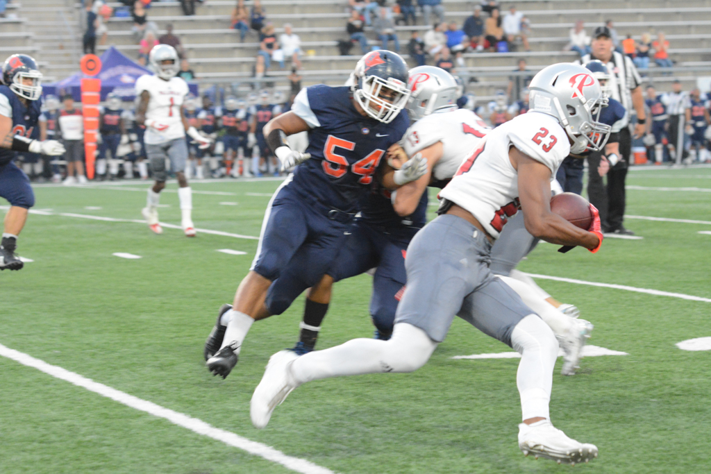 Palomar's Rashad Harper moves the ball down the down the field on Oct. 14 against Orange Coast College. Anabel Malacra/The Telescope
