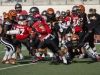 Palomar running back Issiah Aguero (3) breaks the tackle of Riverside City College linebacker Malik Yoakum (11). The Comets hosted the visiting Tigers in a scrimmage held Aug. 27 at Wilson Stadium in Escondido High School. Philip Farry/The Telescope