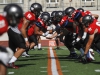 Palomar’s offense and defense warm up against each other prior to the scrimmage against visiting Riverside City College. The scrimmage was held Aug. 27 at Wilson Stadium in Escondido High School. Philip Farry/The Telescope