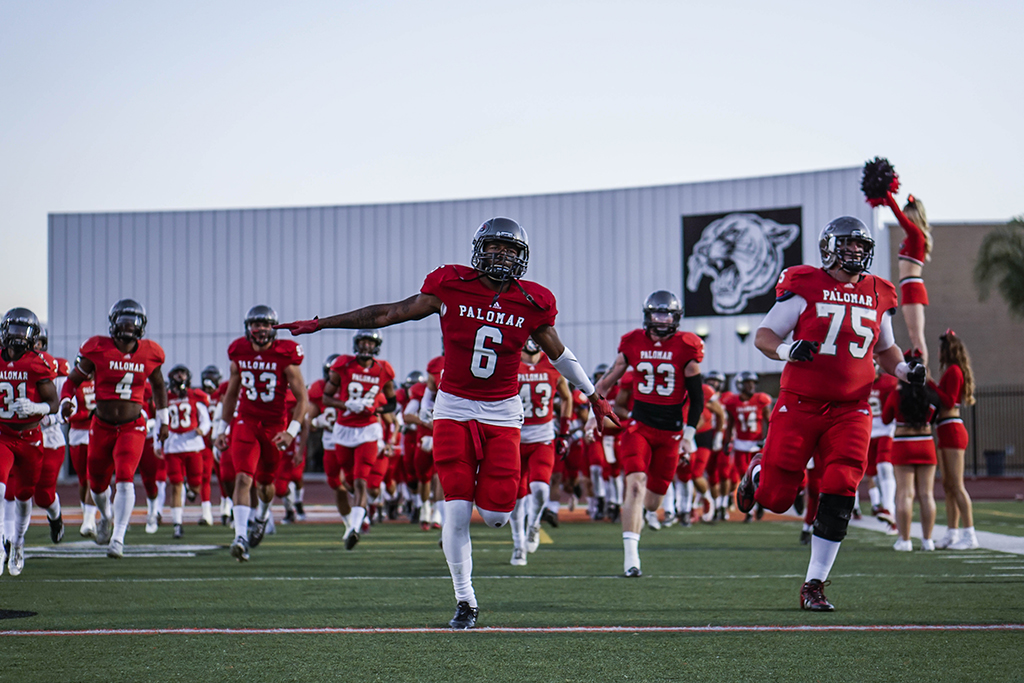 Palomar’s Terrell Arnold (#6) leads the team on the field against visiting Saddleback Collage Nov 5. The Comets were defeated by the Gauchos 39-27. Philip Farry / The Telescope