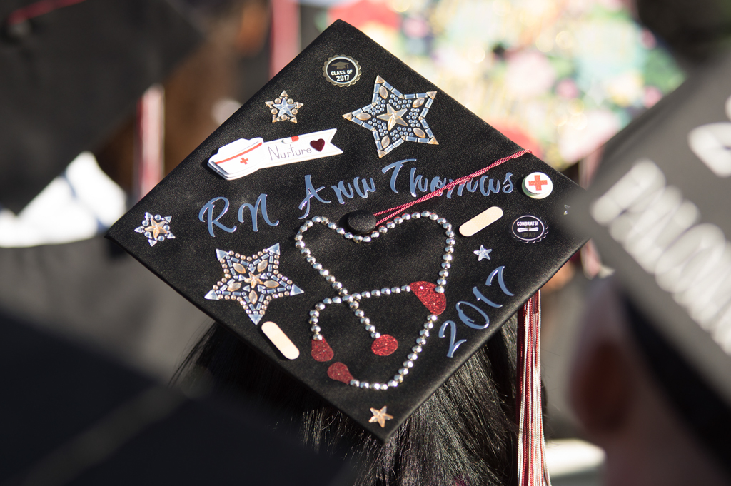 Many of the graduating students decorate their caps at the commencement ceremony at Palomar College in San Marcos, Calif. on May 26, 2017. Joe Dusel / The Telescope