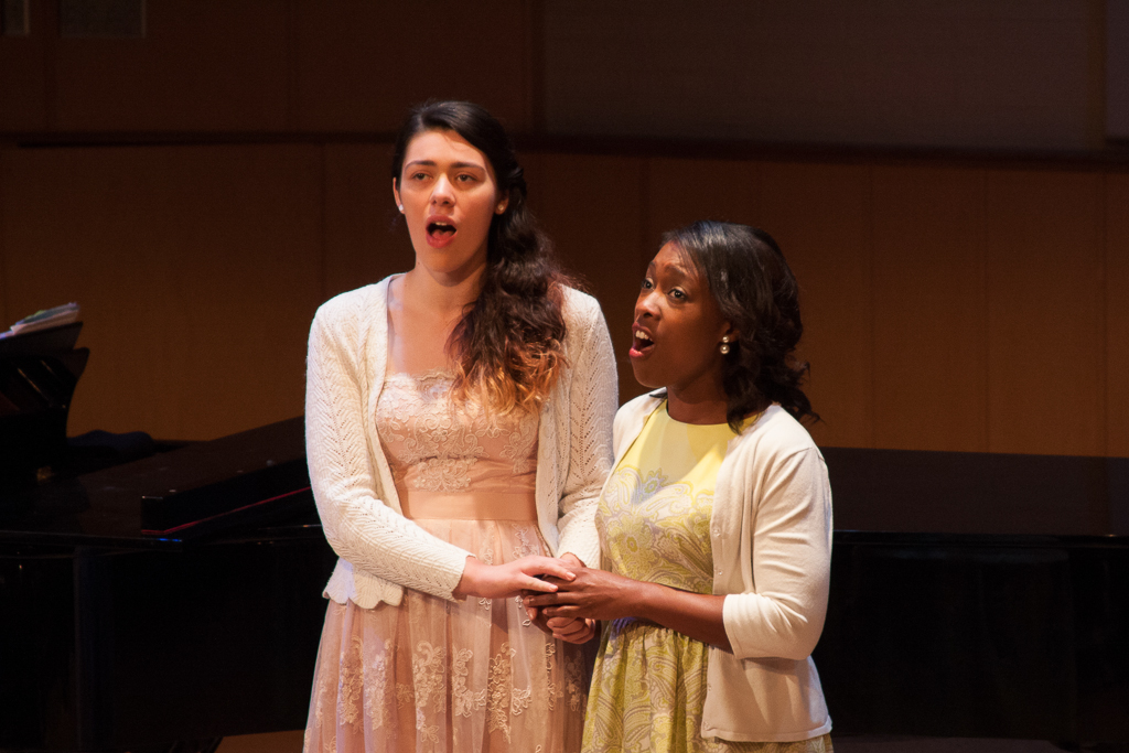 Vocalists, Audrey Lee Young and Clara Vanwinkle Kelly (l-r, foreground), sing part of the "Duo des Fleurs" ("The Flower Duet") from "Lakme." The recital featured six solo instrumentalists, three vocalists, and one jazz quartet. Claudia Rodriguez/The Telescope
