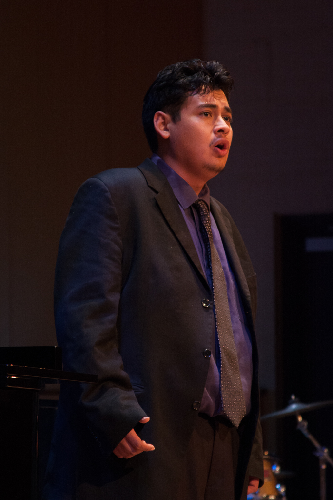 Vocalist, Jose Leonel Guerrero, sings "Questo Amor, Vergogna Mia" from Puccini's opera, "Edgar." Audience members were provided with a written translation of the piece, which reveals a man in turmoil from the humiliation of being rejected by his love. Claudia Rodriguez/The Telescope