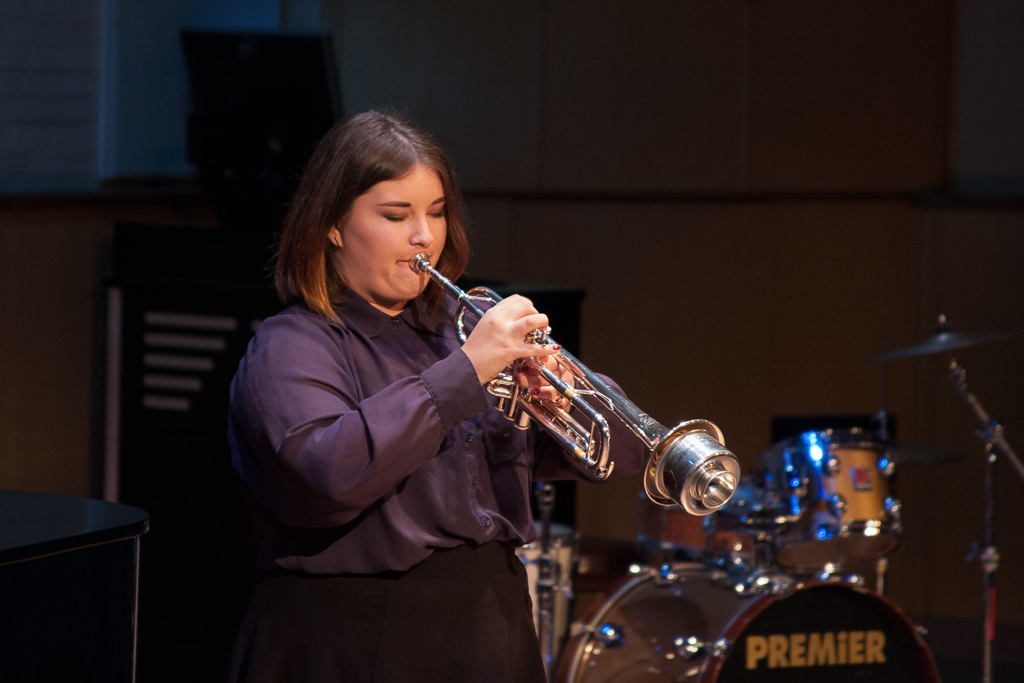 Trumpet player, Maddee MacLeod, plays the "Concerto for Trumpet and Piano" by Alexander Arutunian on Dec. 3 at the Honors Recital. MacLeod said she chose the piece for its interesting musical intricacies as well as for it's strong personal meaning. Claudia Rodriguez/The Telescope