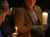 Pastor Greg Bostrom of the Christ Presbyterian Church, and others, hold candles during an interfaith candlelight vigil that honored the memory of the victims of San Bernardino massacre. The event was hosted by the Christ Presbyterian Church of Carlsbad, the Jewish Collaborative of San Diego and the the North County Islamic Foundation. Dec. 8, 2015 in Carlsbad. Photo by Lou Roubitchek / The Telescope