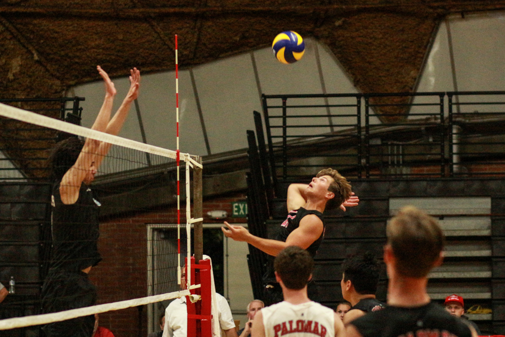 Palomar Tyler Hedley (11) jumps to slam the ball netting Palomar a point at the Dome in the first set 2-1 March 2. Christopher Jones/The Telescope