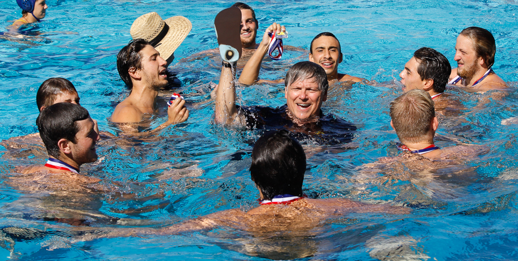 Palomar head coach Jem McAdams (center) celebrates with his team after they won the 2016 Men's Water Polo PCAC Conference Game between Palomar and Grossmont on Nov. 5 at the Ned Baumer Pool. Palomar men won the title with a score of 10-9. Coleen Burnham/The Telescope