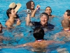 Palomar head coach Jem McAdams (center) celebrates with his team after they won the 2016 Men's Water Polo PCAC Conference Game between Palomar and Grossmont on Nov. 5 at the Ned Baumer Pool. Palomar men won the title with a score of 10-9. Coleen Burnham/The Telescope