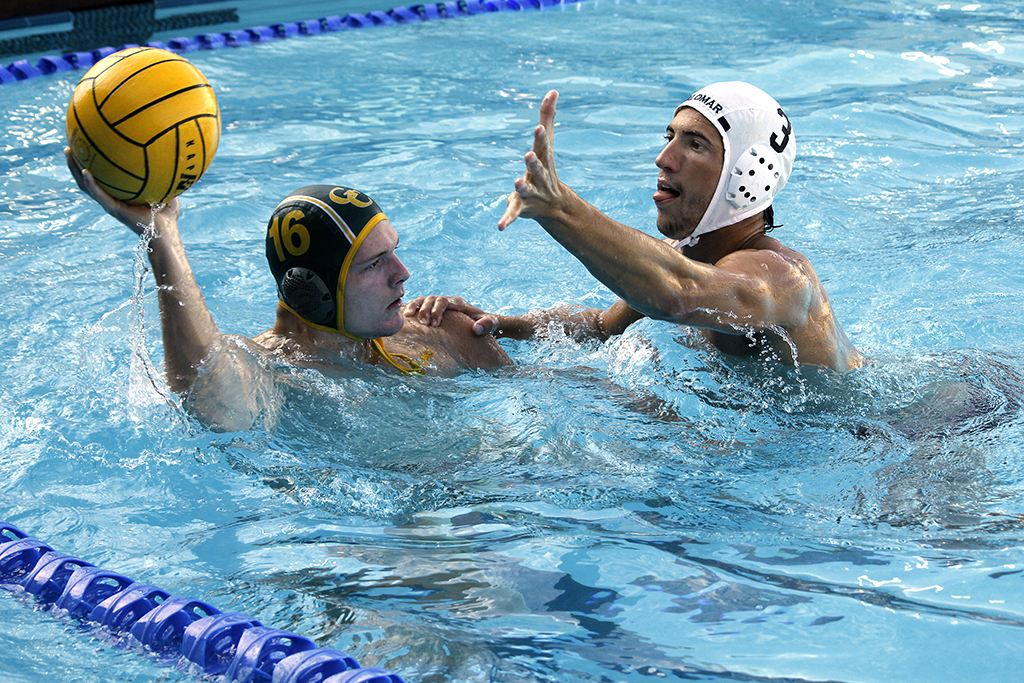 Palomar's Eli Foli (3) defends the ball against Grossmont's Conner Keils (16) during the Men's Water Polo game between Palomar and Grossmont on Oct. 26 at the Kroc Center. Coleen Burnham/The Telescope