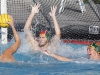 Palomar's Paul Schaner (5) throws goal six for the Comets during the Men's Water Polo game between Palomar and Grossmont on Oct. 26 at the Kroc Center. Grossmont goalie Rockne O'Brian (1) and Naone Hasenstab (20) play defence. Coleen Burnham/The Telescope