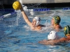 Palomar's Tim Sheehy (9) gains possession of the ball ahead of Grossmont's Naone Hasenstab (20) during the Men's Water Polo game between Palomar and Grossmont on Oct. 26 at the Kroc Center. Tristin D'Ambrosi (2) and Chase Lirley (18) look on. Coleen Burnham/The Telescope
