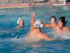 Palomar's Grant Curry (8) throws the ball past Grossmont's Josh Johnson (2) during the men's water polo against Grossmont on Sept. 28 at the Wallace Memorial Pool. Palomar men won 15-10. Coleen Burnham/The Telescope