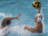 Palomar's Dylan Van Horn (21) attempts to throw a goal over Mesa's Wyatt Schmidt (4) during the men's water polo game between Palomar and Mesa on Sept. 21 at the Mesa College Pool. Palomar men won 24-12. Coleen Burnham/The Telescope
