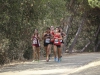 Palomar freshmen Hannah Lopez (right) #1358 makes her way through the course with other runners in Palomar College's Cross Country Invitational at Guajome Park. Oceanside CA. Sept 8. Larie Tobias Chairul / The Telescope