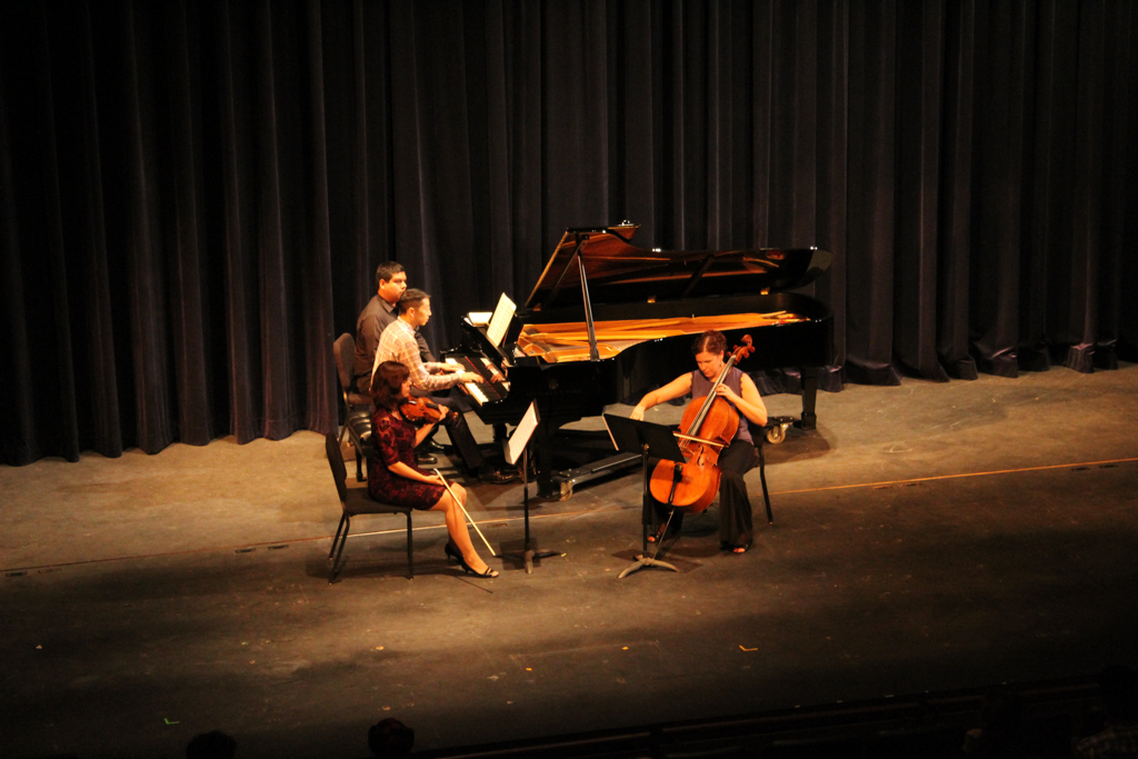 Balboa Trio Victoria Bietz (Violinist), Byron Chow (pianist), and Erica Erenyi (cellist) perform for Palomar stuents during concert hour at Howard Brubeck Theatre. Allen Burton / The Telescope
