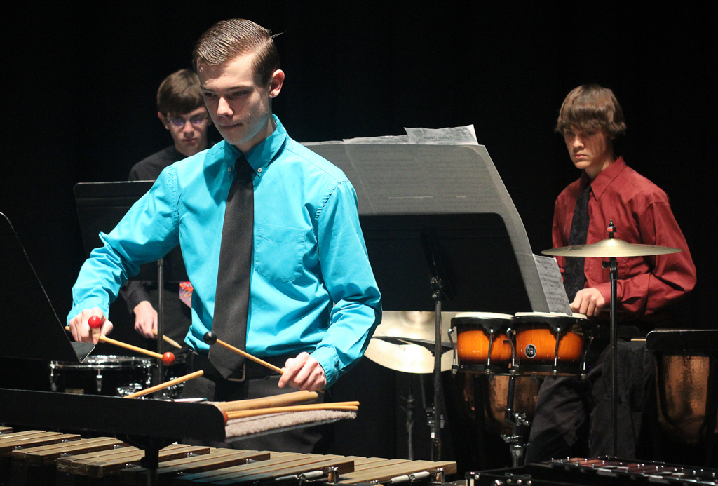 Palomar Percussion Ensemble member Sebastian Bate (front) performs with (back, l to r) Teddy Gigstad and Chase Bentley during Tap in Time at the Studio Theatre on Mar 12. Coleen Burnham/The Telescope