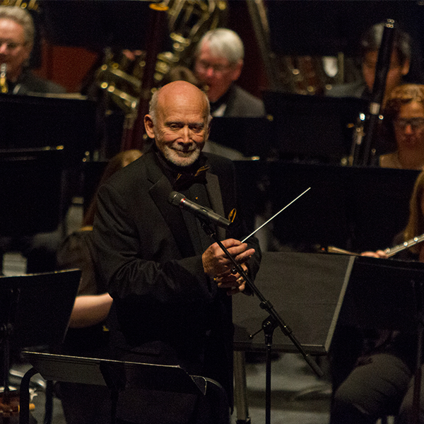 Kenneth Bell, musical director and conductor of the Palomar/Pacific Coast Concert Band, looks to the audience during the Heroes and Heroines Performance, Feb 24. Savhanna Vargas/The Telescope