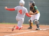 Palomar short-stop Brooke Huddleson (4) slides safely into home plate in the bottom of the 1st against Grossmont College on April 8. Comets beat the Griffins 11-3. Tracy Grassel/The Telescope